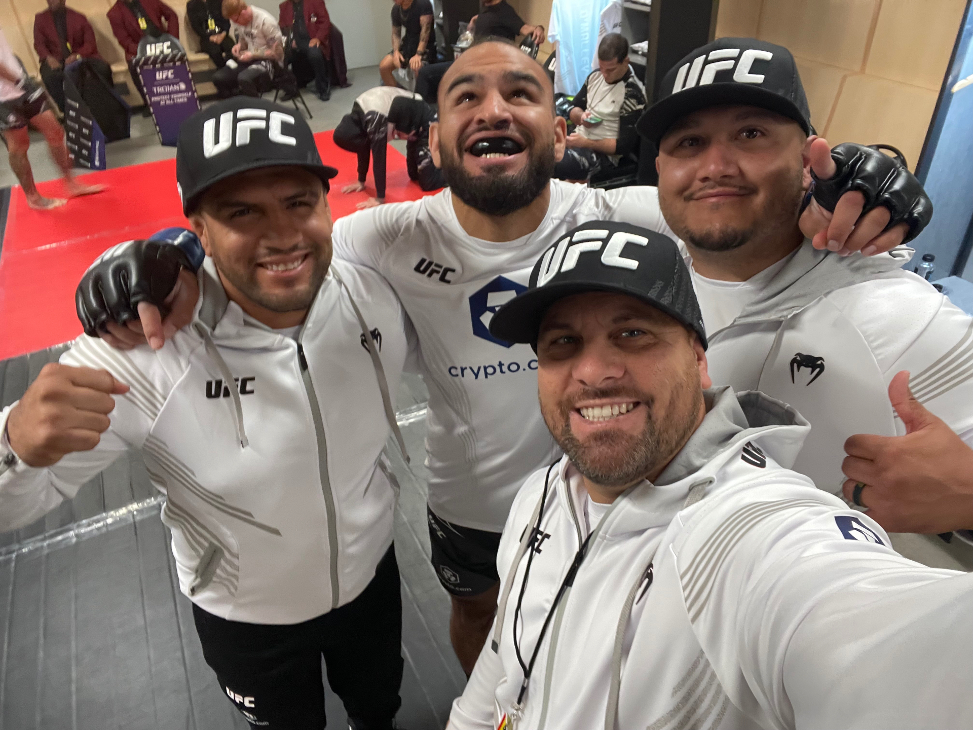 The Subfighter MMA corner team backstage with Gabe Green before he walks out