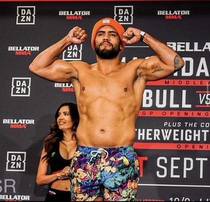 Josh Jones flexing at a Bellator MMA weigh-in