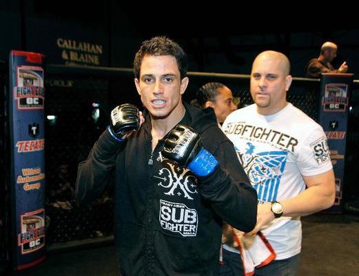 Jason Carbajal in a Subfighter jacket with gloves up before a fight